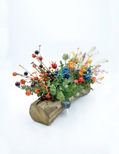 Tronco con flores otoñales artificiales